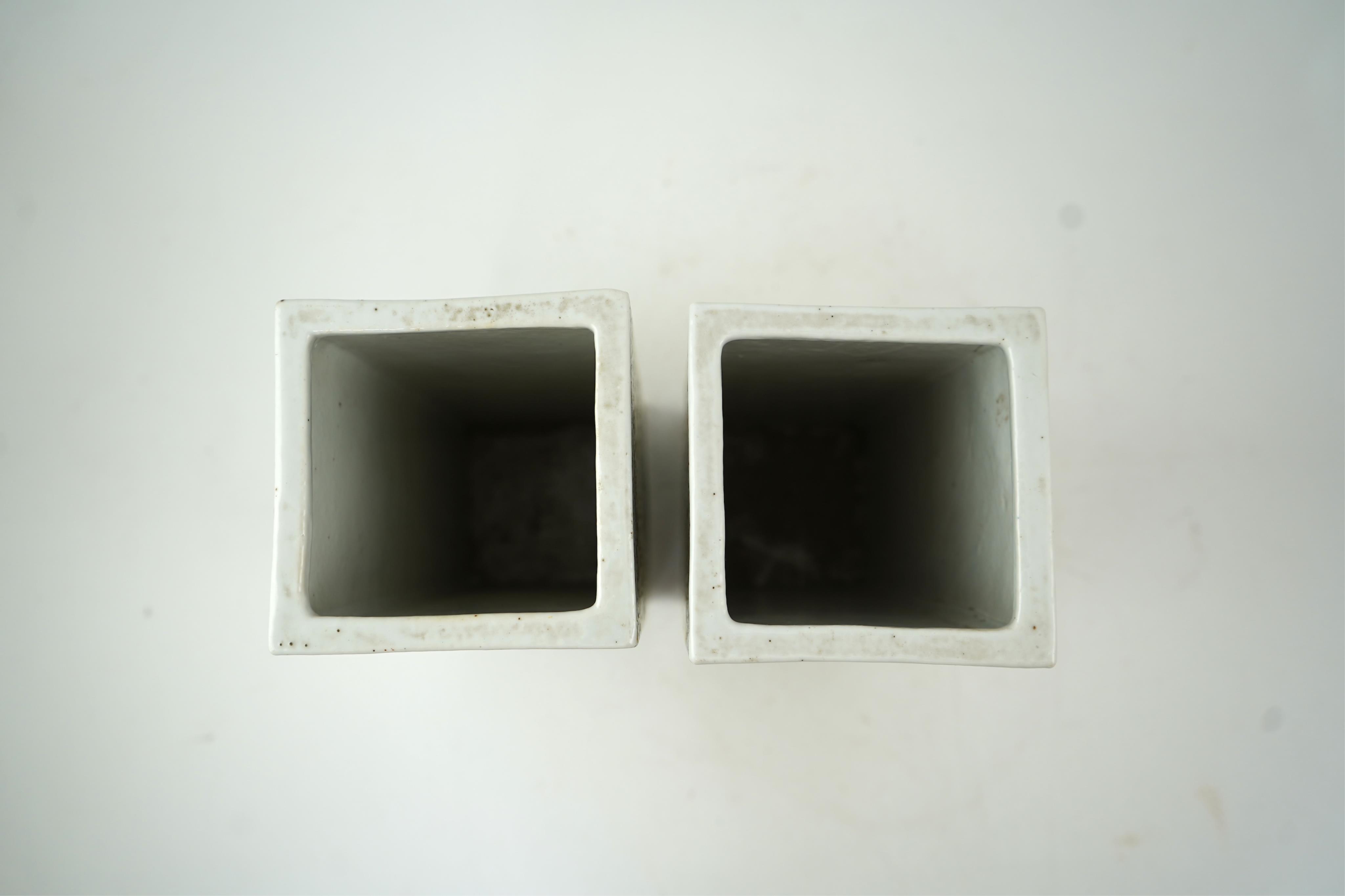 A pair of Chinese yellow ground square vases, late 19th century
